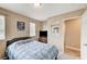Cozy bedroom featuring natural light from two windows and neutral color scheme at 967 Coronado Peak Ave, Las Vegas, NV 89183