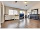 Bonus room features hardwood floors and natural light from dual pane windows at 9746 Vista Cache Ct, Las Vegas, NV 89148