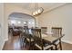 Open dining room showcasing a large table with seating and access to the spacious living room at 9746 Vista Cache Ct, Las Vegas, NV 89148
