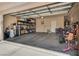 Spacious garage with ample storage shelving and space for parking at 9746 Vista Cache Ct, Las Vegas, NV 89148