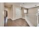 Upstairs hallway featuring hardwood floors and access to multiple rooms at 9746 Vista Cache Ct, Las Vegas, NV 89148