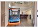 Entryway view of an open concept living space with high ceilings and hardwood floors at 9746 Vista Cache Ct, Las Vegas, NV 89148