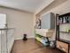 Loft area features hardwood floors and natural light at 9746 Vista Cache Ct, Las Vegas, NV 89148
