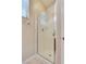 Bathroom features a stand up shower with glass doors, tile surround, and chrome fixtures at 9746 Vista Cache Ct, Las Vegas, NV 89148