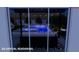 Virtual backyard view featuring a pool, spa, patio furniture, and desert landscaping, perfect for outdoor entertaining at 10239 Meandering Dell Ave, Las Vegas, NV 89166