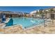 Beautiful community pool with crystal-clear water and ample space for residents to enjoy at 10239 Meandering Dell Ave, Las Vegas, NV 89166