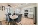 Kitchen/Dining Area features stainless appliances, eat in dining set and natural light at 10413 Rising Harbor Ave, Las Vegas, NV 89129