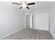 Bedroom with a ceiling fan, closet, and neutral carpeting at 120 Wynntry Dr, Henderson, NV 89074