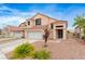 Well-maintained home with drought-resistant landscaping and a spacious two-car garage at 120 Wynntry Dr, Henderson, NV 89074