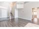 Inviting living room with wood floors, neutral paint, and a staircase at 120 Wynntry Dr, Henderson, NV 89074