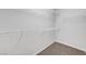 Empty walk-in closet with wire shelving and neutral carpet at 121 Staplehurst Ave, Henderson, NV 89002