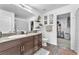 Modern bathroom featuring granite counters, dark wood cabinets, and stylish decor at 12280 Golden Wreath Rd # 3, Las Vegas, NV 89183