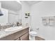 Well-lit bathroom with granite counters, modern fixtures, and neutral decor at 12280 Golden Wreath Rd # 3, Las Vegas, NV 89183
