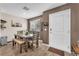 Cozy dining room with seating for six, natural light, and modern decor at 12280 Golden Wreath Rd # 3, Las Vegas, NV 89183