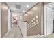 Upstairs hallway with neutral walls, carpet flooring, and tastefully curated wall art at 12280 Golden Wreath Rd # 3, Las Vegas, NV 89183