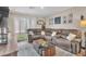 Inviting living room featuring a comfortable sectional sofa and stylish decor, creating a cozy atmosphere at 12280 Golden Wreath Rd # 3, Las Vegas, NV 89183