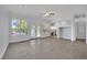 Spacious living room with a fireplace and large windows showcasing the natural light at 1324 European Dr, Henderson, NV 89052