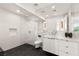 Sleek bathroom with modern fixtures, a glass-enclosed shower, and a stylish vanity with marble countertops at 1491 Reims Dr, Henderson, NV 89012