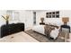 Well-appointed bedroom featuring stylish decor, a large dresser, and a comfortable bed with elegant linens at 1491 Reims Dr, Henderson, NV 89012