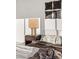 Close up of the bed in a bright bedroom showing details of the pillows and side table at 1491 Reims Dr, Henderson, NV 89012