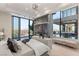 Spacious main bedroom boasts a large window overlooking the city and infinity pool, with modern decor at 1491 Reims Dr, Henderson, NV 89012