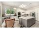 Bright kitchen with a large center island, stainless steel appliances, and a view of the backyard at 1798 Lakewood Dr, Henderson, NV 89012