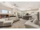 Open floor plan showcases the living room, fireplace, and modern kitchen at 1798 Lakewood Dr, Henderson, NV 89012
