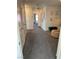 Hallway view featuring multiple closets, interior decor, and a glimpse of a bedroom at 1900 Arietta Vista St, Henderson, NV 89044