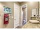 Stylish bathroom featuring a vessel sink, stone countertop, and a separate toilet room at 2008 Winter Wind St, Las Vegas, NV 89134