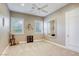 Neutral bedroom with ample natural light, complemented by carpet flooring and a ceiling fan at 2008 Winter Wind St, Las Vegas, NV 89134