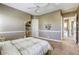 Cozy bedroom featuring neutral color scheme and access to hallway, with plush carpet and abundant natural light at 2008 Winter Wind St, Las Vegas, NV 89134