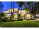 Attractive home with stone accents, manicured landscaping, and a charming walkway leading to the entrance at 2008 Winter Wind St, Las Vegas, NV 89134
