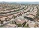 High-angle aerial view of a planned community displaying orderly streets and landscaped front yards at 2080 Powder Springs St, Henderson, NV 89052