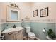 Charming powder room featuring decorative wallpaper, classic fixtures, and a mirror for a touch of elegance at 2080 Powder Springs St, Henderson, NV 89052