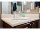 Bathroom sink with a mirror and decorative hardware on the wood vanity at 2080 Powder Springs St, Henderson, NV 89052