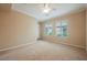 Bright, roomy bedroom with neutral tones, a ceiling fan, and ample natural light creates a serene atmosphere at 2080 Powder Springs St, Henderson, NV 89052