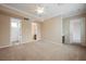 Large bedroom with carpet, ceiling fan, and ensuite bath, perfect for creating a personalized space at 2080 Powder Springs St, Henderson, NV 89052