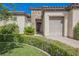 Charming single-story home with a well-manicured lawn and mature landscaping and a one-car garage at 2080 Powder Springs St, Henderson, NV 89052