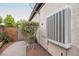 View of an evaporative cooler, on an exterior wall at 2080 Powder Springs St, Henderson, NV 89052