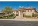 Charming single-story home with a well-manicured lawn, mature landscaping, and a two-car garage at 2080 Powder Springs St, Henderson, NV 89052