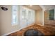 Bright entryway featuring decorative glass double doors and sidelights, elegant tile flooring at 2080 Powder Springs St, Henderson, NV 89052