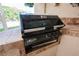Built-in Turbo grill set in tile, perfect for outdoor cooking and entertaining guests at 2080 Powder Springs St, Henderson, NV 89052