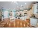 Full kitchen view with granite counters, kitchen island and breakfast nook at 2080 Powder Springs St, Henderson, NV 89052