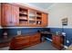 Functional home office featuring built-in storage, desk space, and vintage details for optimal organization and style at 2080 Powder Springs St, Henderson, NV 89052