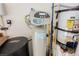 Water filtration system featuring digital display, next to a hot water tank at 2080 Powder Springs St, Henderson, NV 89052