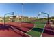 Outdoor basketball court with two goals offers a safe space for neighborhood children to exercise and play games at 2194 Trivero St, Henderson, NV 89044
