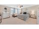 Bedroom with large windows and patterned bedding at 2194 Trivero St, Henderson, NV 89044