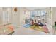 Bright dining area features large windows and a colorful rug at 2194 Trivero St, Henderson, NV 89044