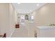 Upstairs hallway featuring neutral color palette and ample natural light at 2194 Trivero St, Henderson, NV 89044