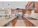 Modern kitchen featuring stainless steel appliances, granite countertops, and ample storage space at 2194 Trivero St, Henderson, NV 89044